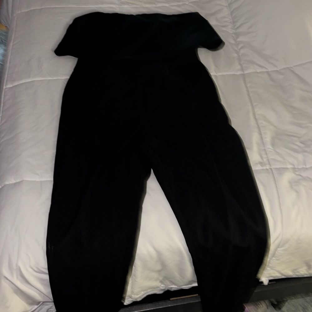 Black sleeveless jumpsuit